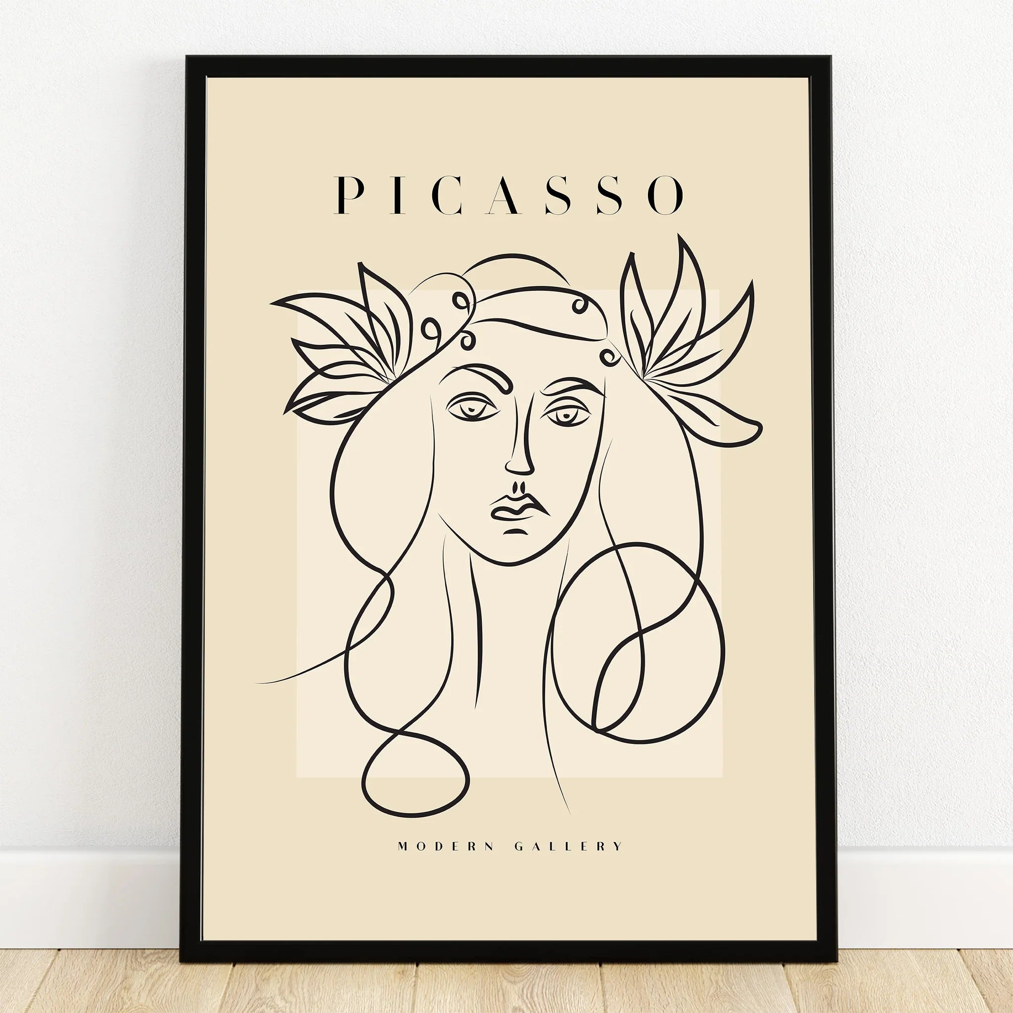 Minimalist Picasso-inspired line art portrait print with black frame, modern wall decor