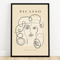 Minimalist Picasso-style line art portrait print in black frame, modern wall decor art