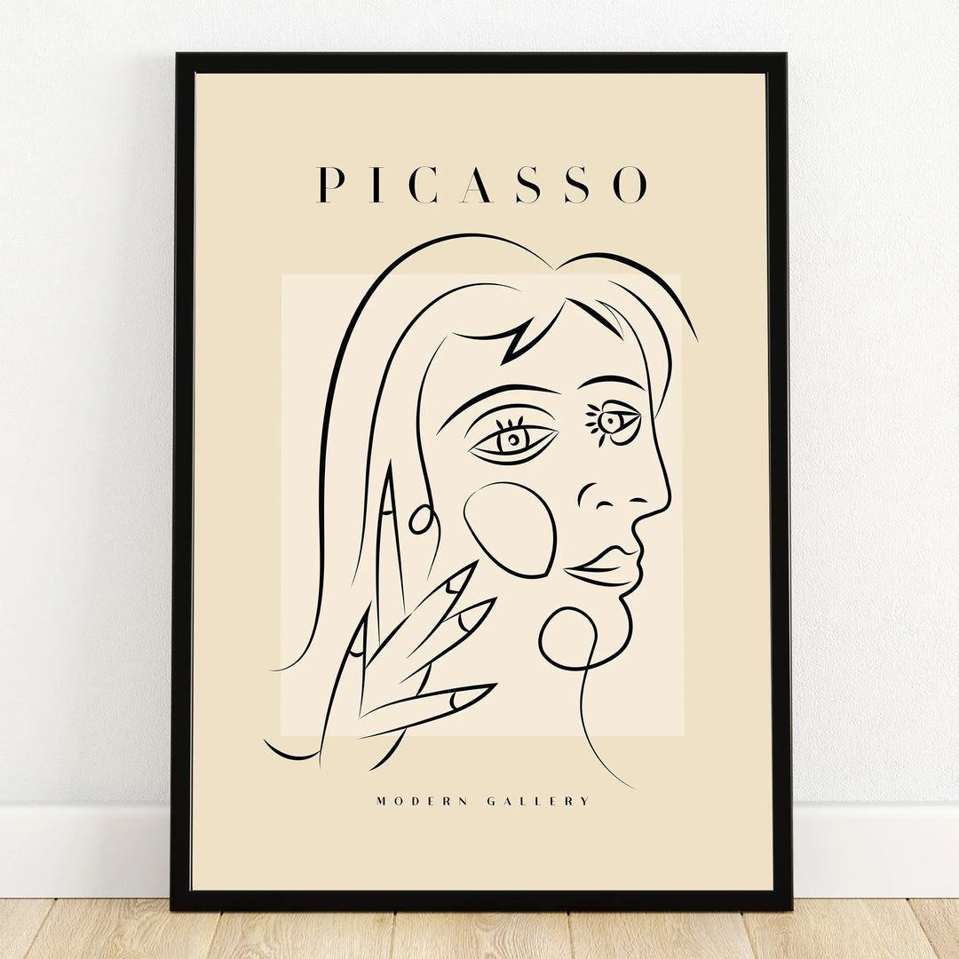 Minimalist Picasso-style line art portrait print in black frame, modern abstract wall art