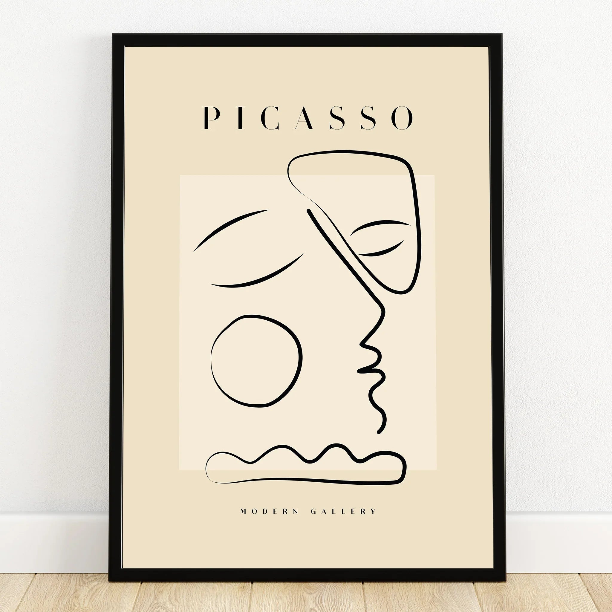 Abstract Picasso style wall art print with minimalist black line face in black frame