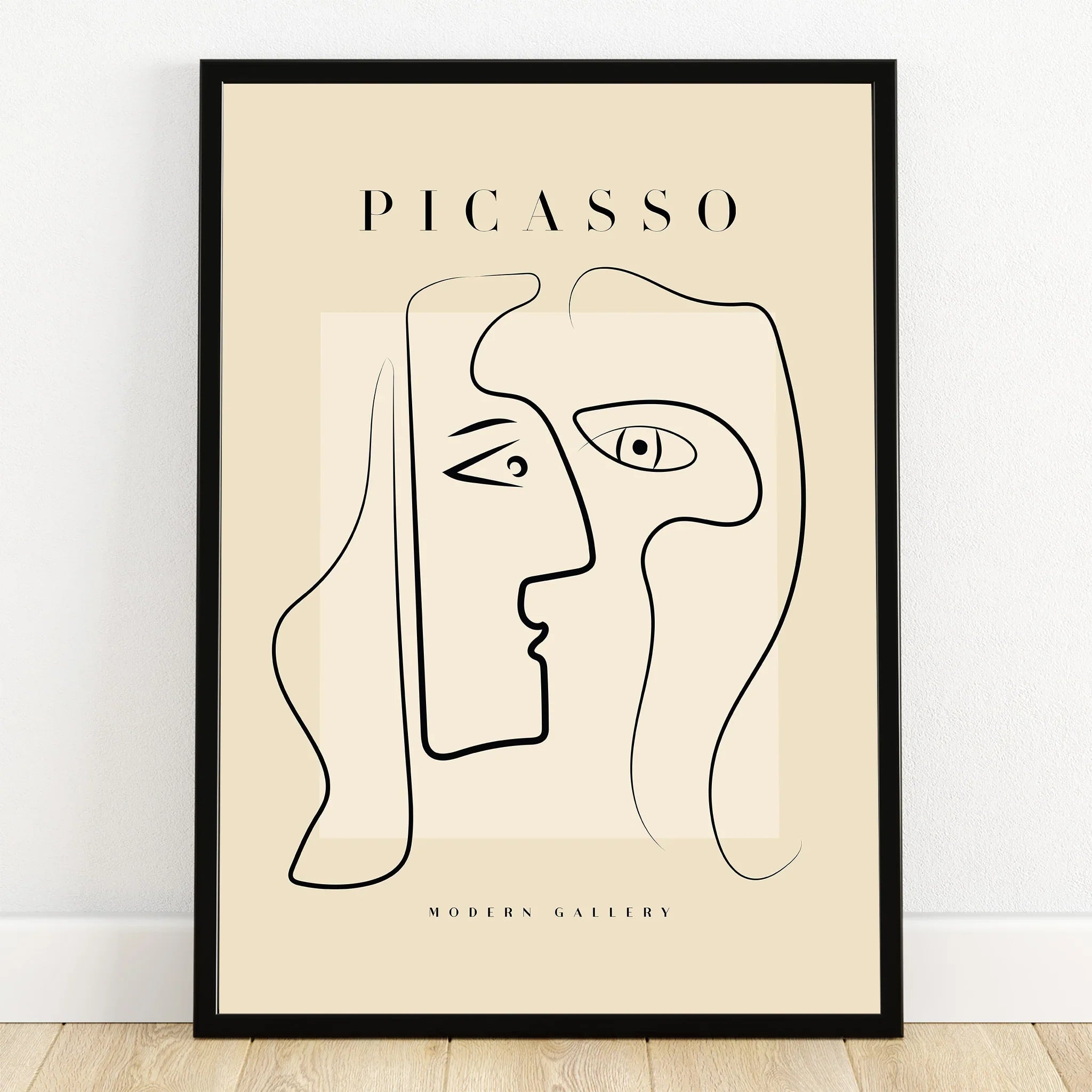 Minimalist Picasso-inspired line art poster with abstract face in black frame, modern wall decor