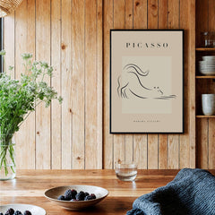 Picasso Stretching Cat Line Art Minimalist Animal Poster Modern Gallery Print Wall Art displayed in a cozy interior.