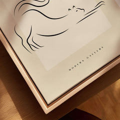 Picasso Stretching Cat Line Art Minimalist Animal Poster Modern Gallery Print Wall Art displayed in a framed setting.