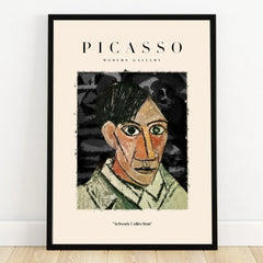 Framed Picasso modern art print featuring abstract male portrait on gallery wall