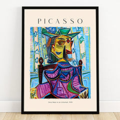 Framed Picasso art print of abstract woman portrait in vibrant colors, modern wall decor