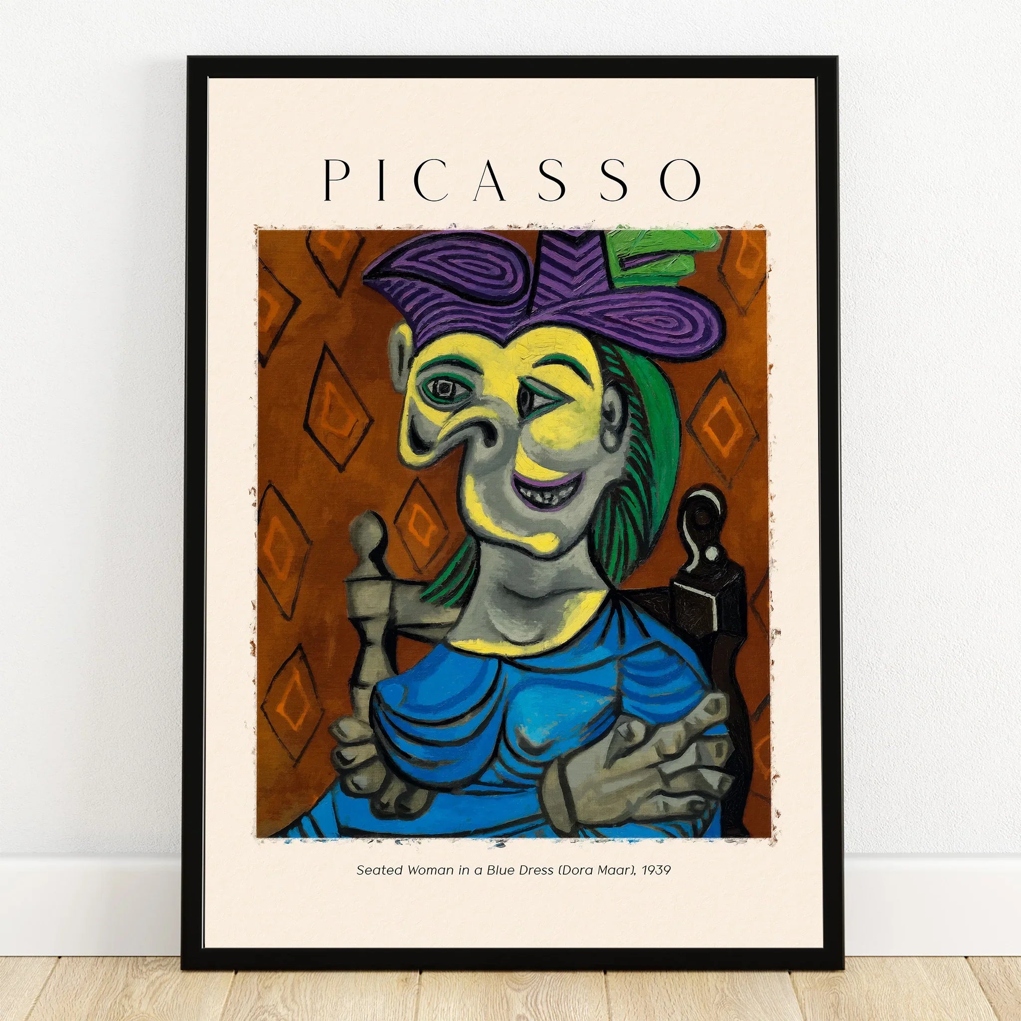 Framed Picasso abstract art print of Seated Woman in a Blue Dress, colorful wall decor