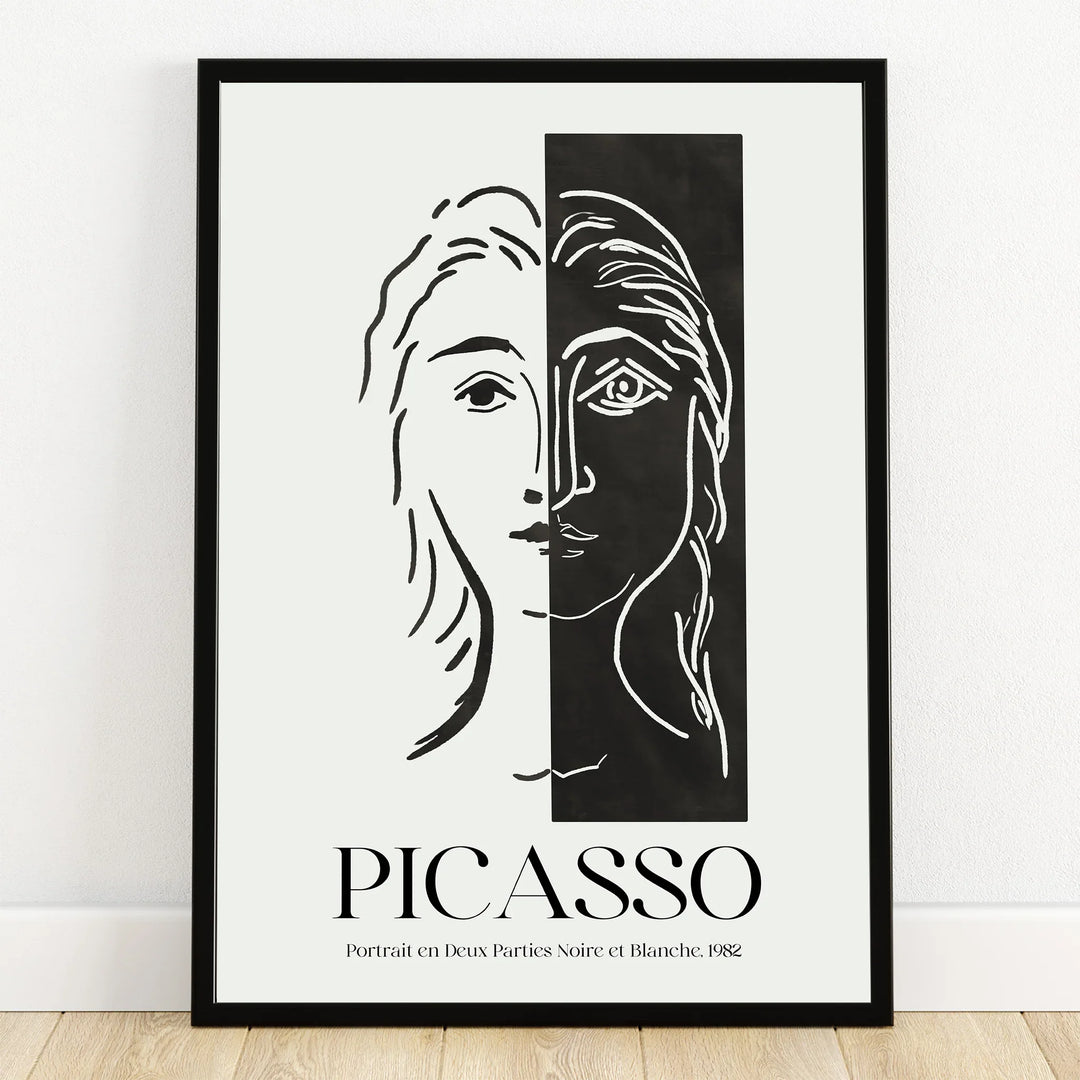 Minimalist black and white line art portrait print in a black frame, Picasso style wall art.