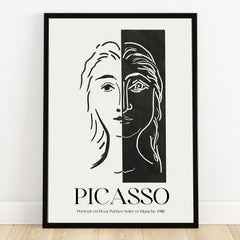 Minimalist black and white line art portrait print in a black frame, Picasso style wall art.