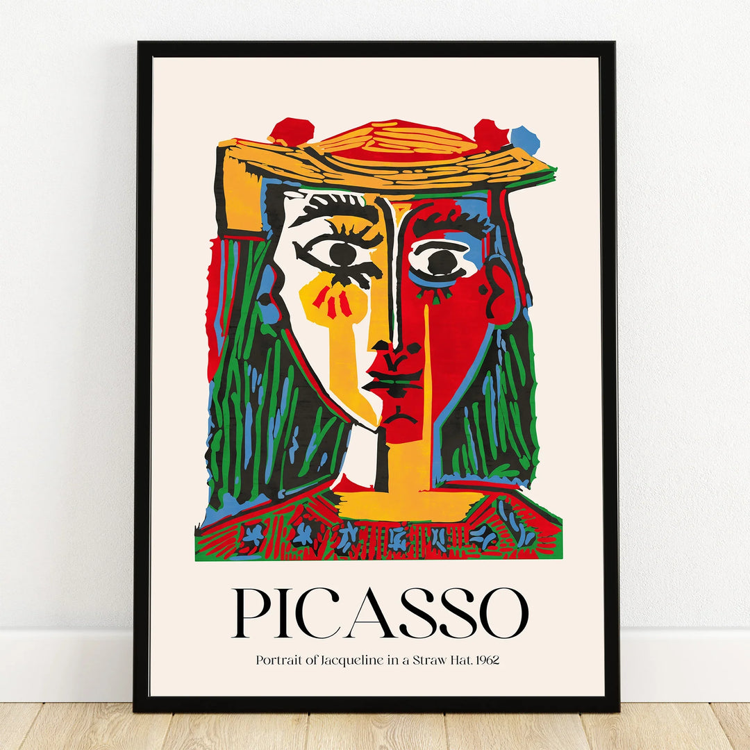 Framed modern art print of Picasso's abstract portrait with bold colors and black frame