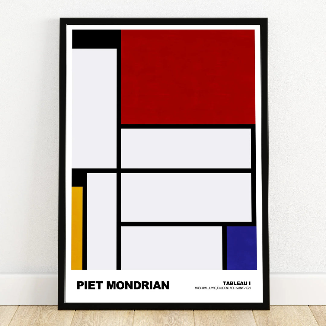 Framed abstract wall art print with red, yellow, blue, and black geometric shapes