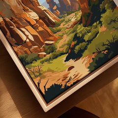 Close-up of framed canvas print with colorful canyon landscape, natural wood frame, wall art