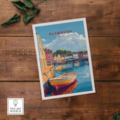 Plymouth Travel Poster showcasing a picturesque harbour scene with colorful buildings and a boat on the water.
