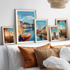 Plymouth Travel Poster displayed among other travel posters featuring vibrant harbour scenes and colorful cityscapes.