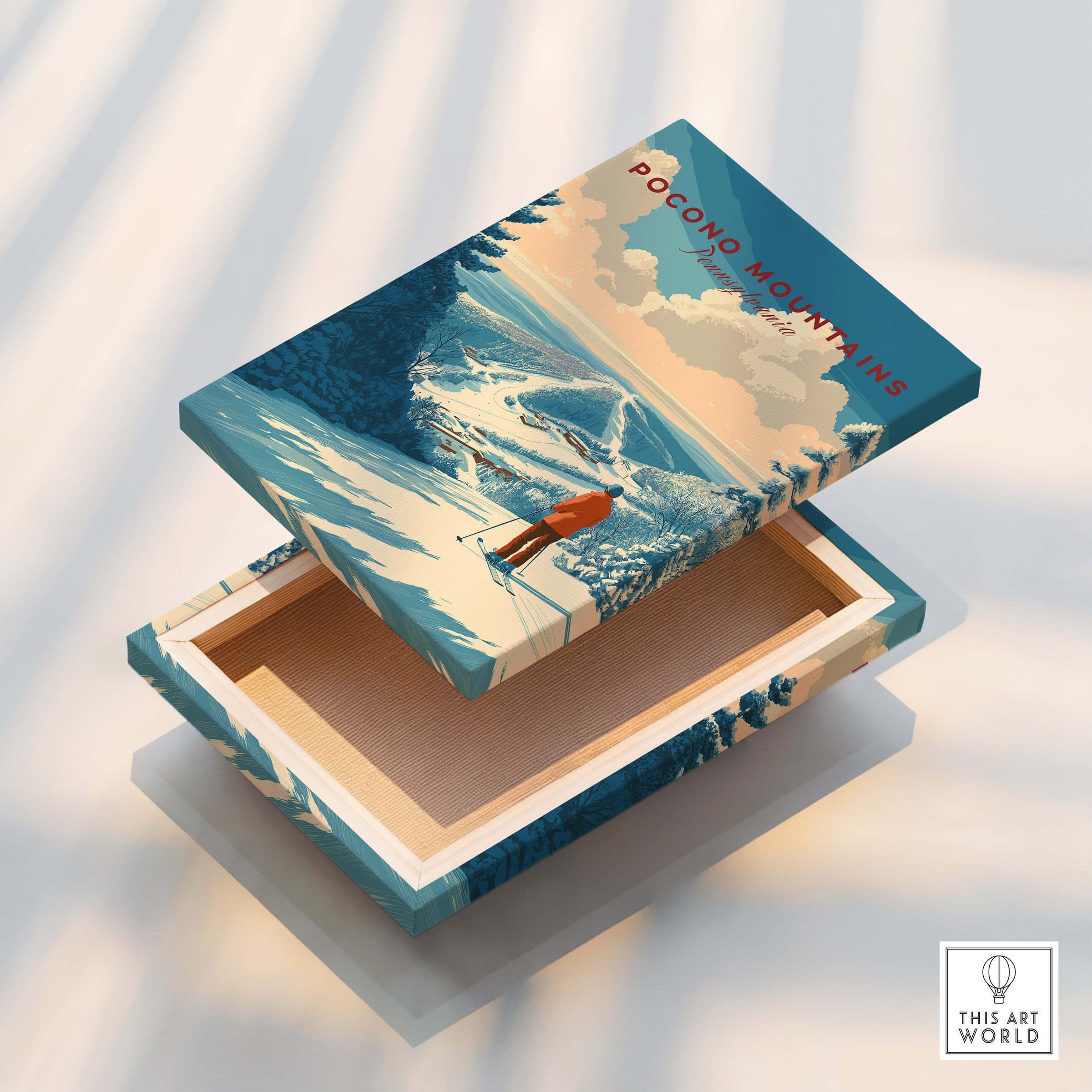 Pocono Mountains Ski Print on a decorative box showcasing a scenic winter landscape and skier.