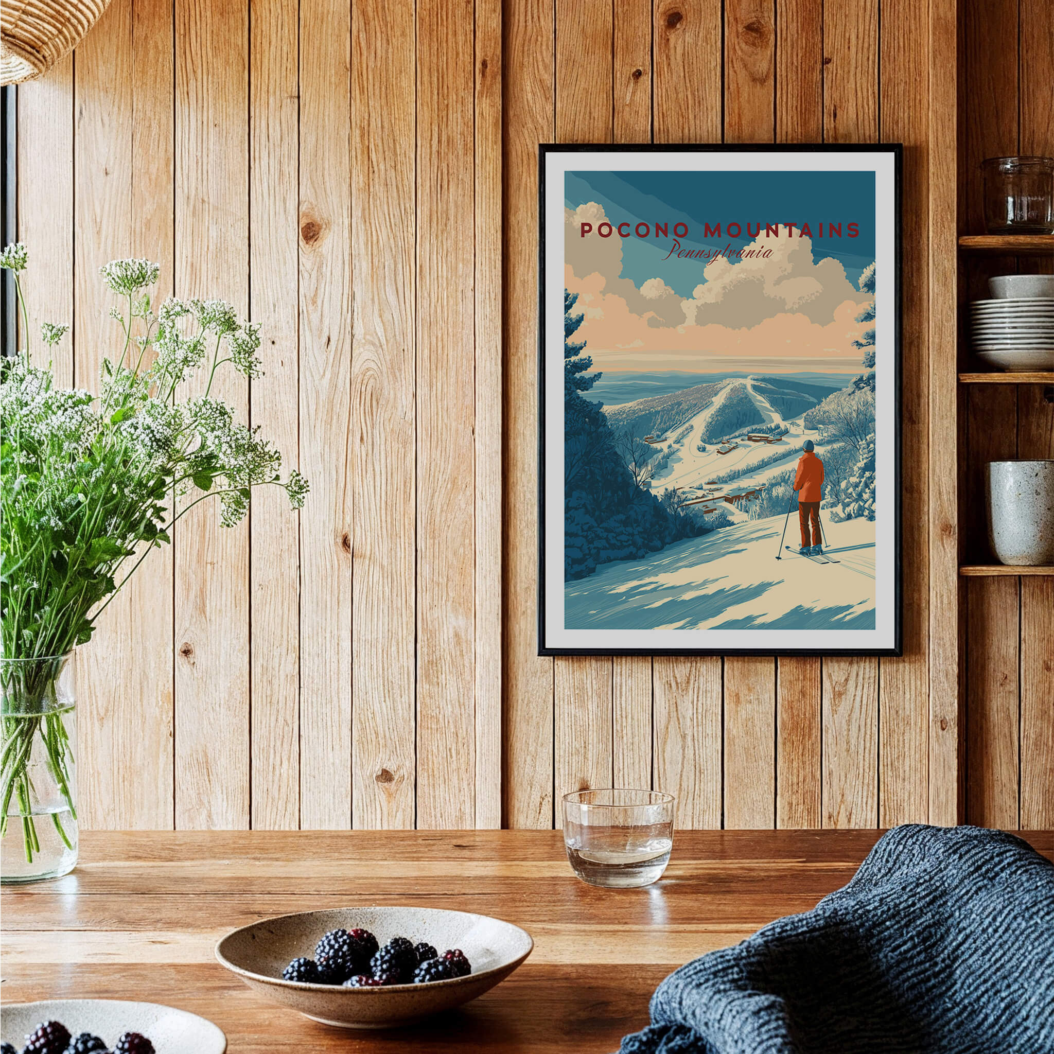 Pocono Mountains Ski Print framed on wooden wall with a scenic winter landscape and skier, perfect for nature and ski lovers.