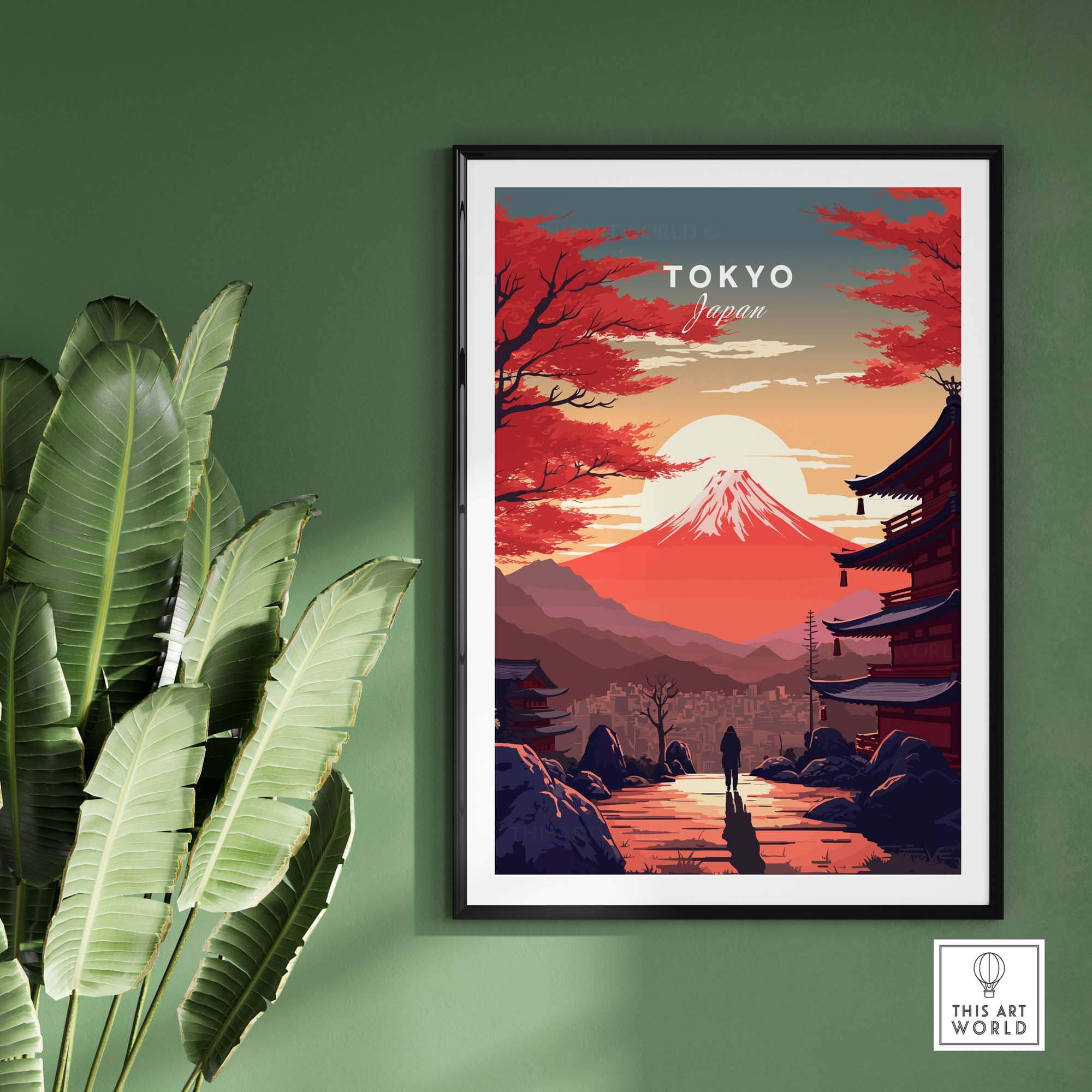 Stunning Tokyo wall art featuring Mount Fuji at sunset, framed and displayed against a green wall.