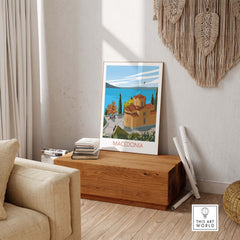 Macedonia wall art print displayed in a cozy room on a wooden table, showcasing vibrant colors and elegant design.