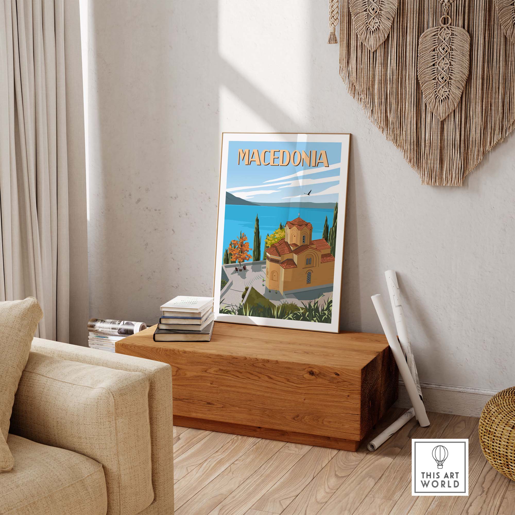 Vibrant Macedonia travel poster print displayed on a wooden box in a stylish living room setting.