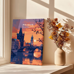 Prague Poster showcasing a stunning sunset view of the city with historic buildings and reflections in water.