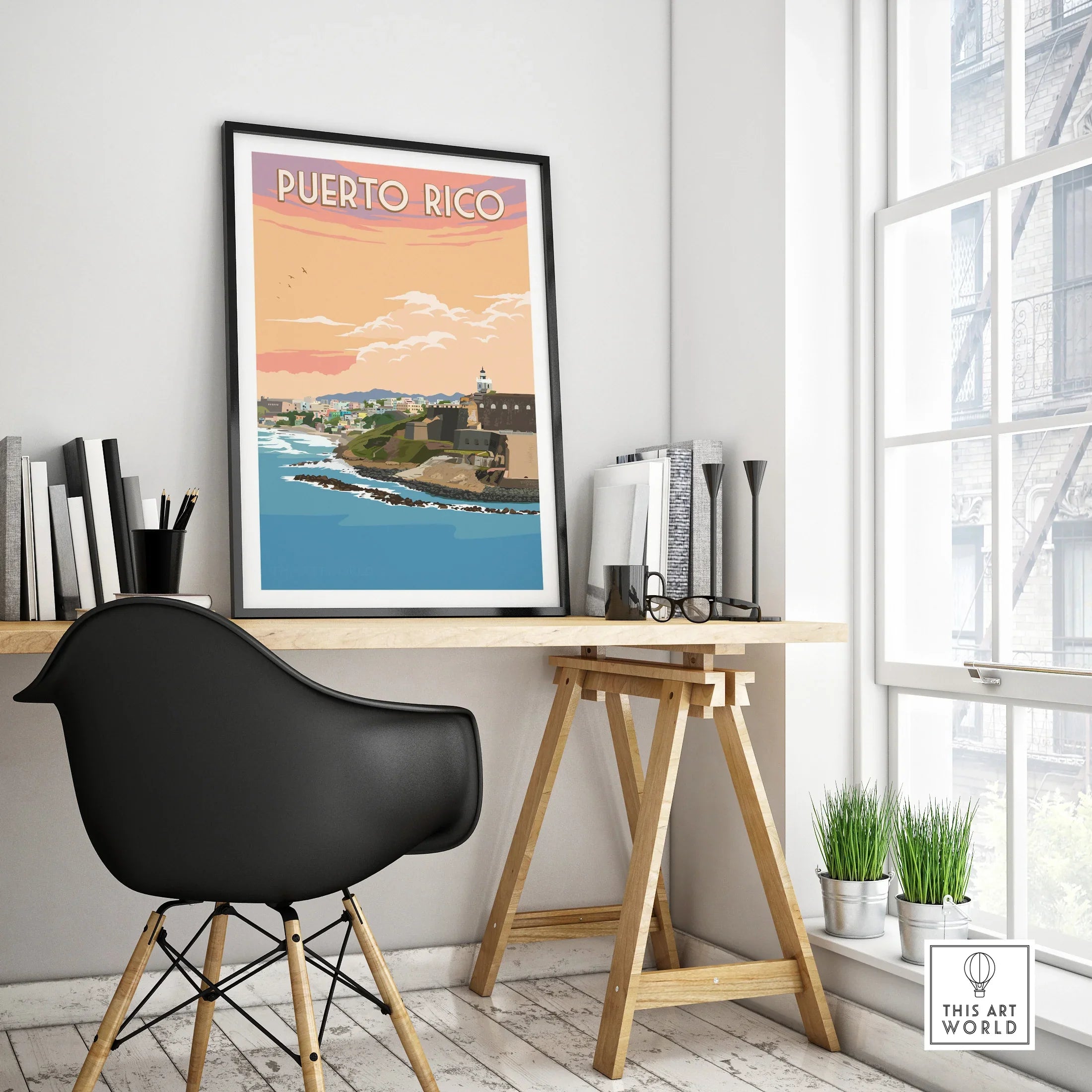 Puerto Rico travel poster with coastal cityscape, lighthouse, and sunset, framed on desk for home decor