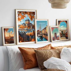 Quebec Travel Print featuring Château Frontenac and various travel art prints displayed on a stylish couch.