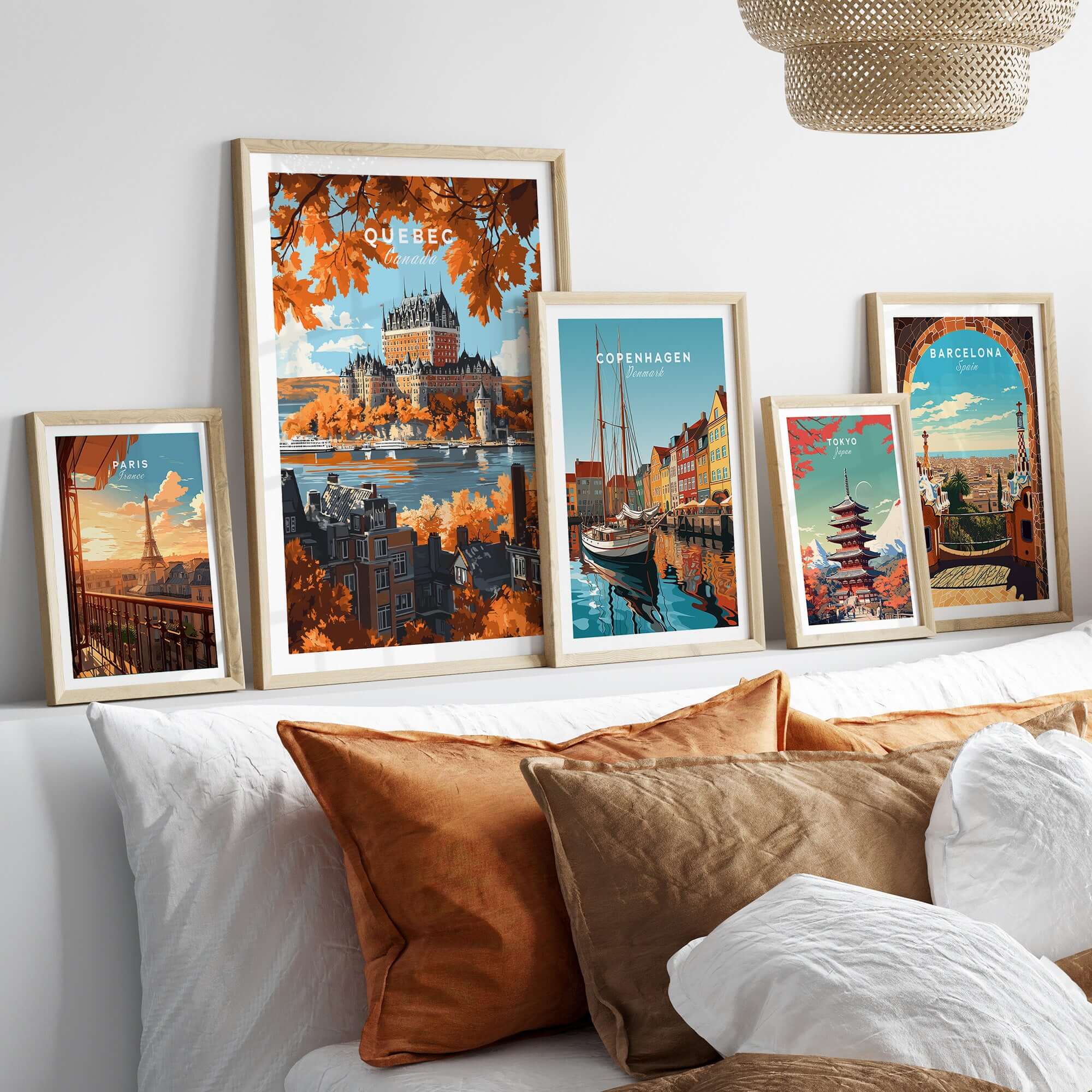 Quebec Travel Print featuring Château Frontenac and various travel art prints displayed on a stylish couch.
