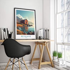 Reykjavik Iceland wall art poster displayed in a modern home office setting with wooden furniture and green plants.