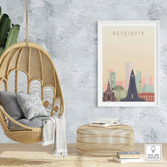 Reykjavik skyline poster displayed in a modern interior with a hanging chair and decorative elements.