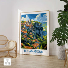 Rocamadour wall art travel poster showcasing the medieval village's cliffside beauty and vibrant landscape in a stylish interior setting.