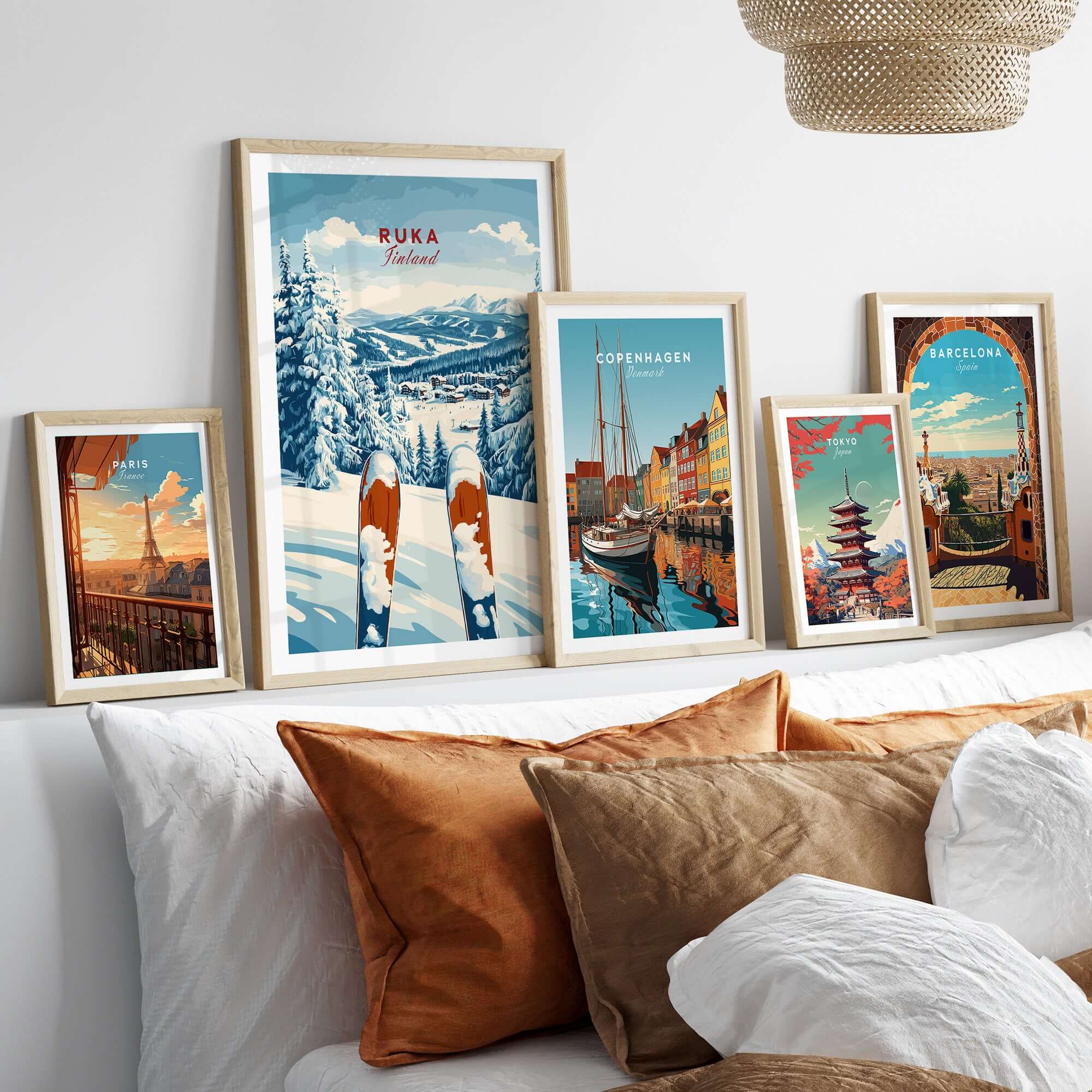 Beautiful Ruka Ski poster among other travel-themed prints on a cozy sofa, perfect for winter sports lovers.