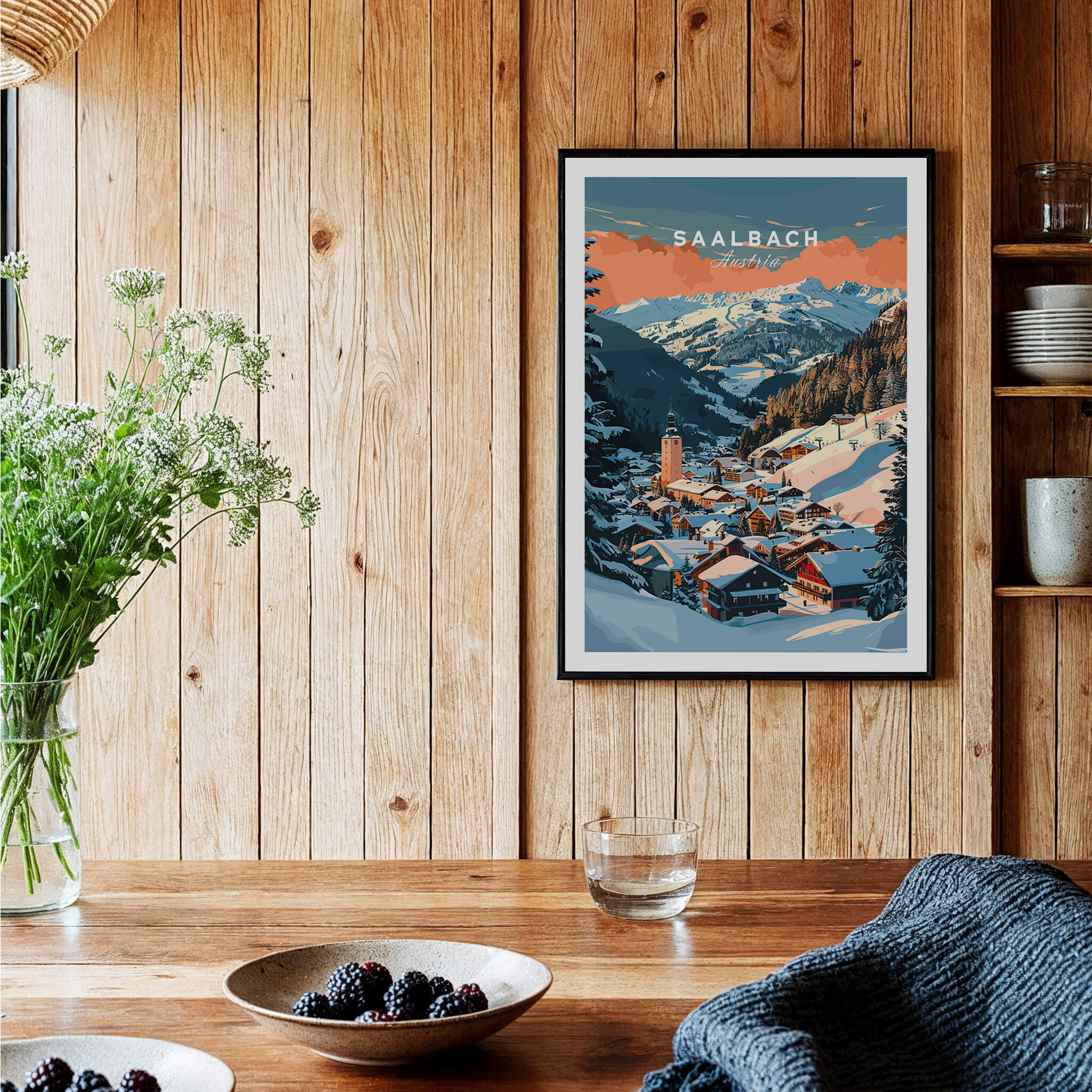 Saalbach Wall Art Print showcasing a beautiful alpine village and ski scene in a cozy home setting.