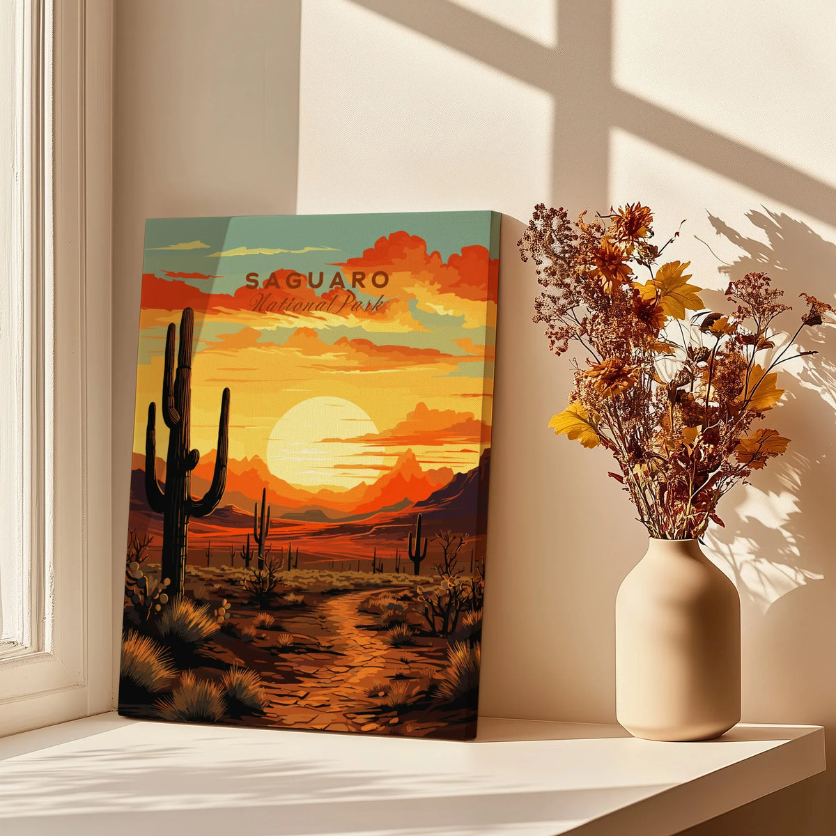 Saguaro National Park travel poster print on canvas beside vase with dried flowers on windowsill