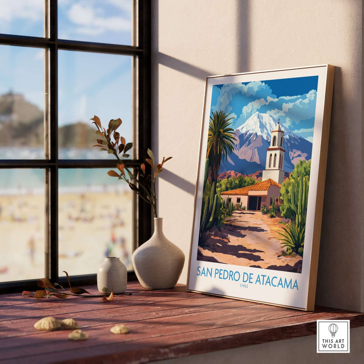 San Pedro de Atacama wall art displayed near a window, showcasing vibrant colors and scenic landscapes of the Chilean oasis.