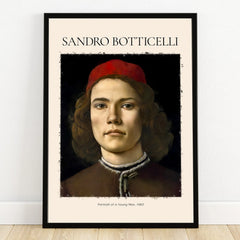 Framed wall art print of a Renaissance portrait, young man in red cap, white background