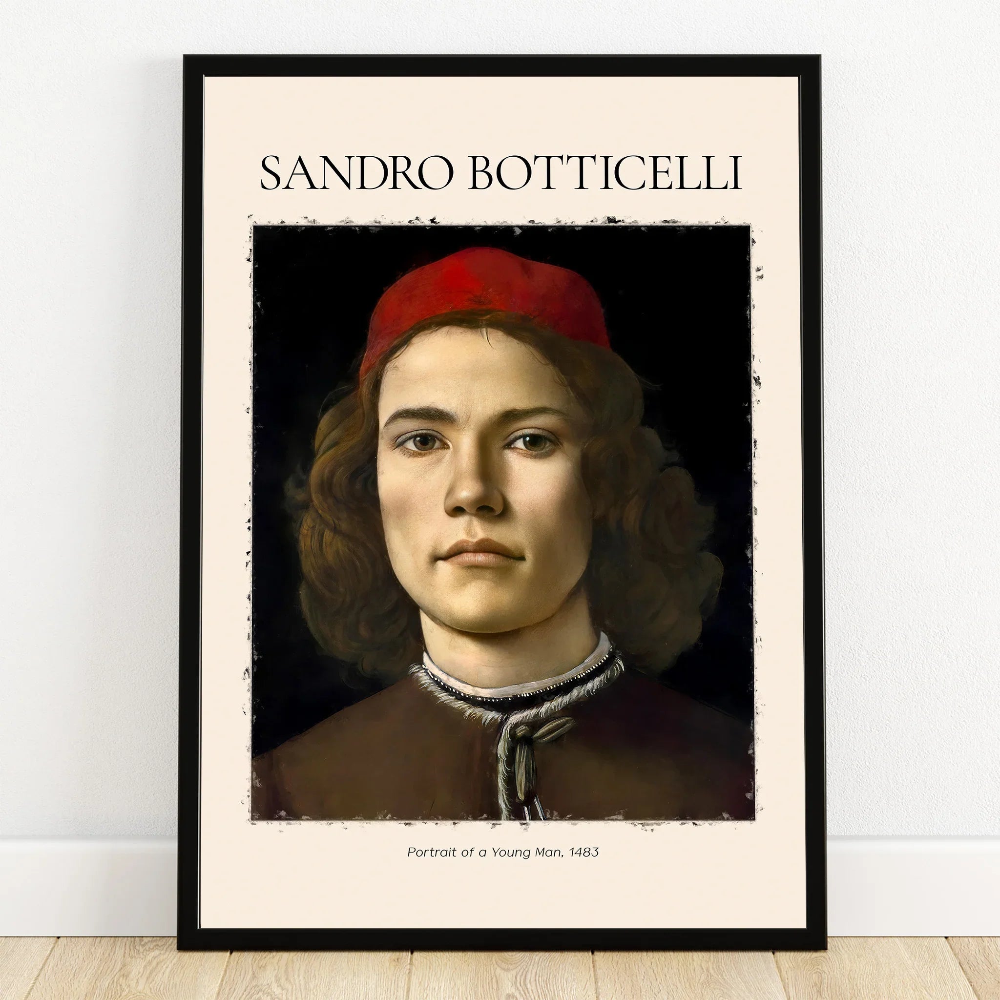 Framed wall art print of a Renaissance portrait, young man in red cap, white background