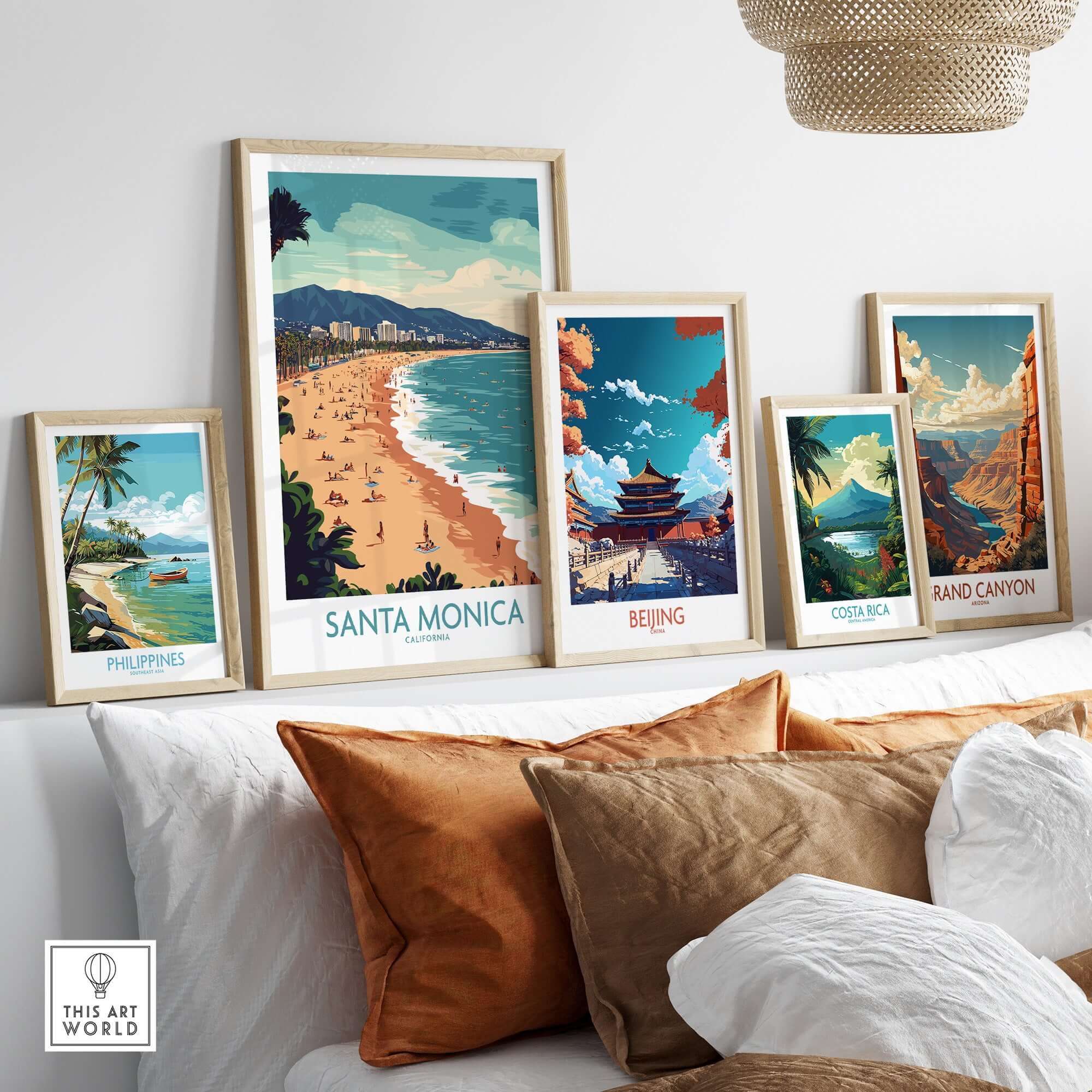 Santa Monica Pier Print – Capture Coastal Memories displayed among other travel-themed prints in a stylish room setting.