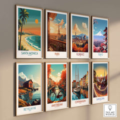 Santa Monica Sunset Wall Art: Beach & Pier Print displayed among global cityscape art prints on a gallery wall.
