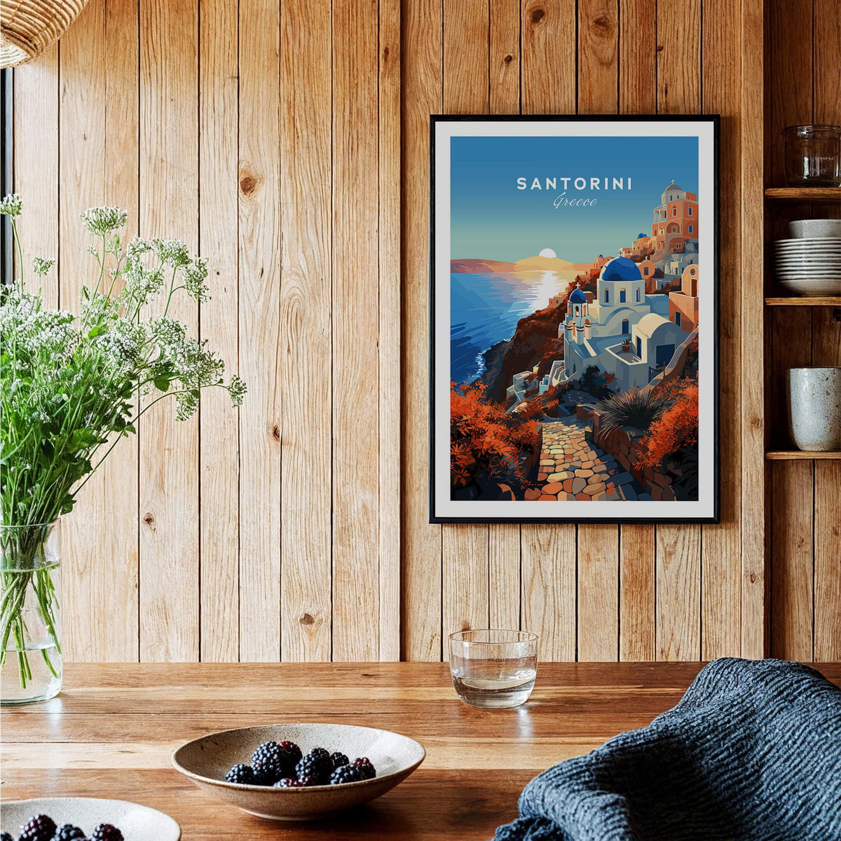Santorini Print showcasing a picturesque sunset over Santorini with vibrant colors and Mediterranean charm in a cozy setting.