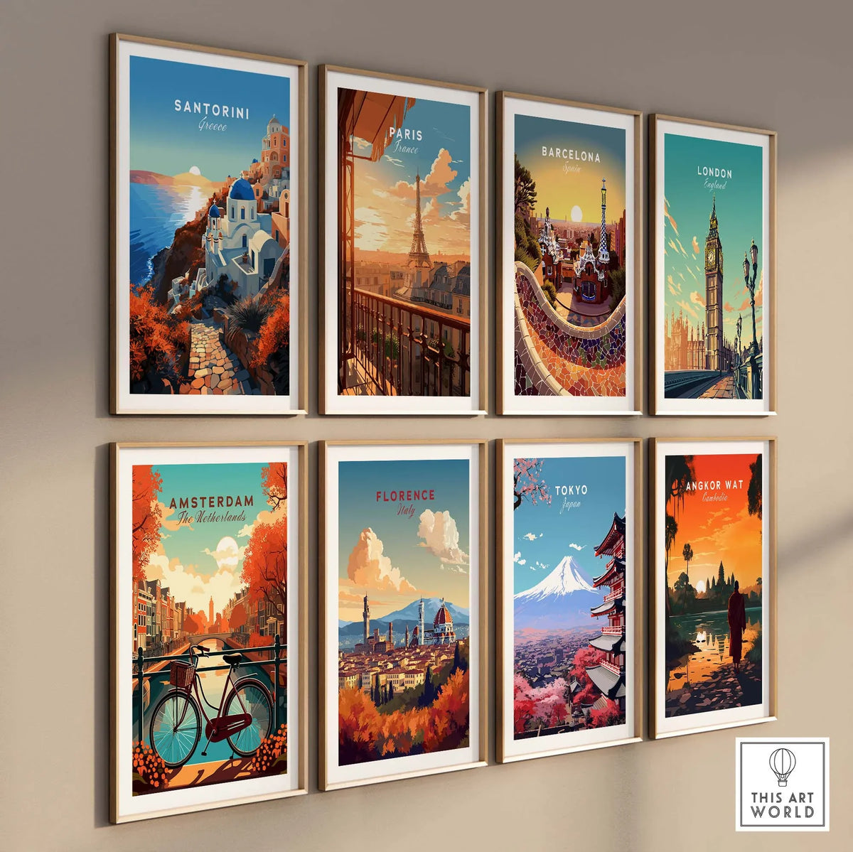 Santorini Print and various city travel posters displayed in elegant frames on a wall.