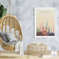 Sao Paulo skyline wall art poster displayed in a stylish interior with a hanging chair and natural decor.