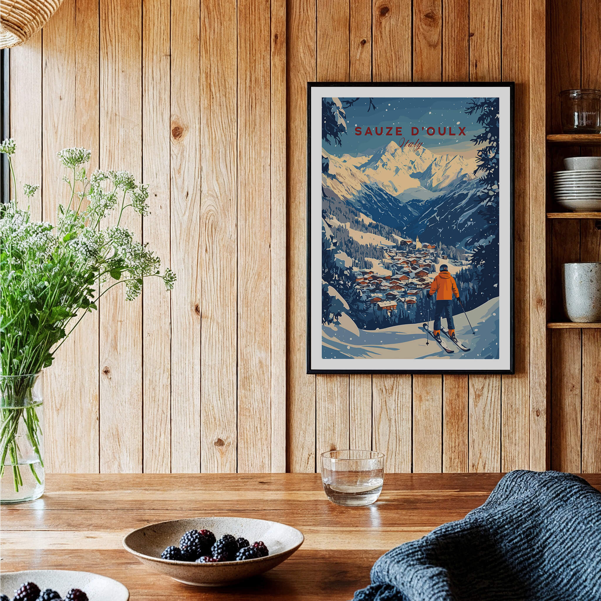 Sauze d'Oulx Ski Wall Art displayed in a rustic setting, showcasing a skier overlooking a snowy mountain village.