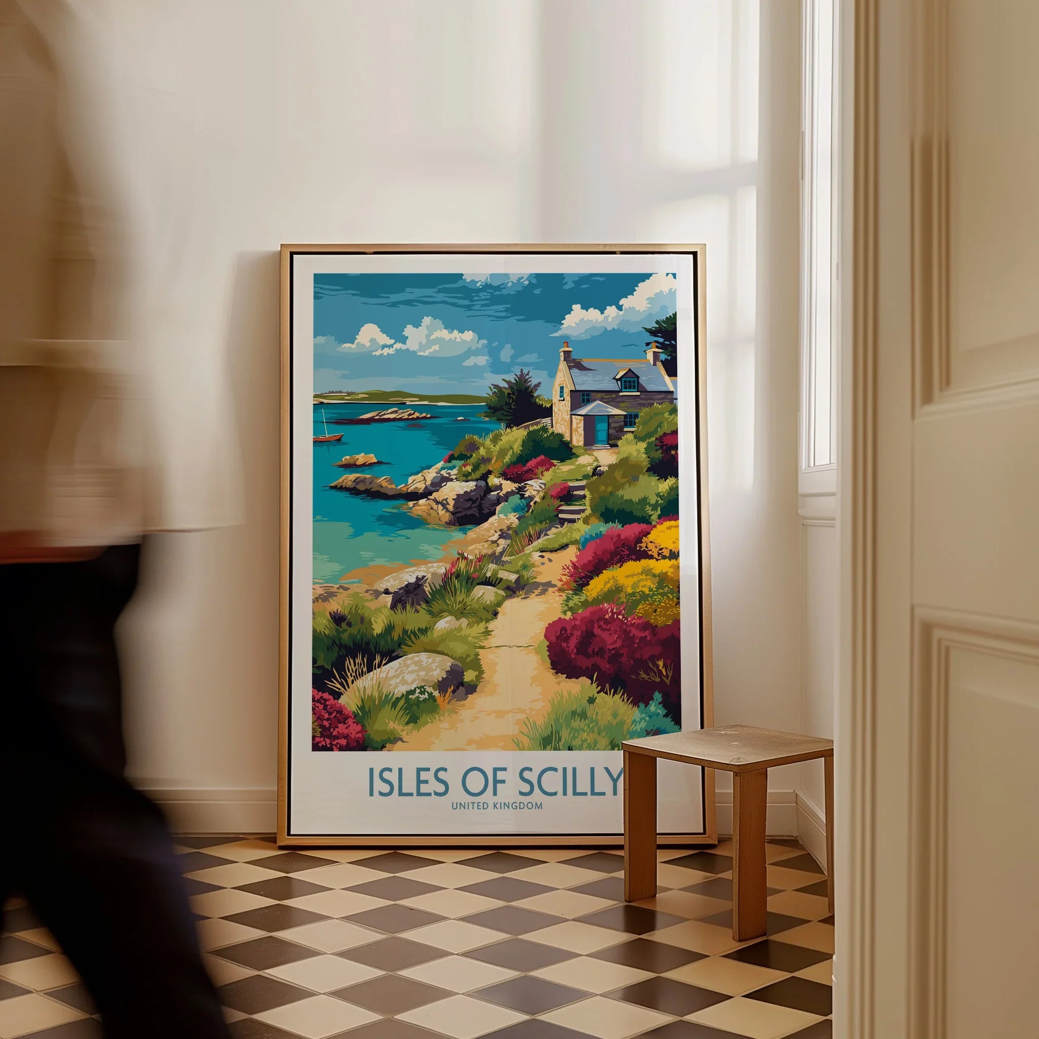 Isles of Scilly Coast Garden Wall Art — framed canvas on floor man walking past