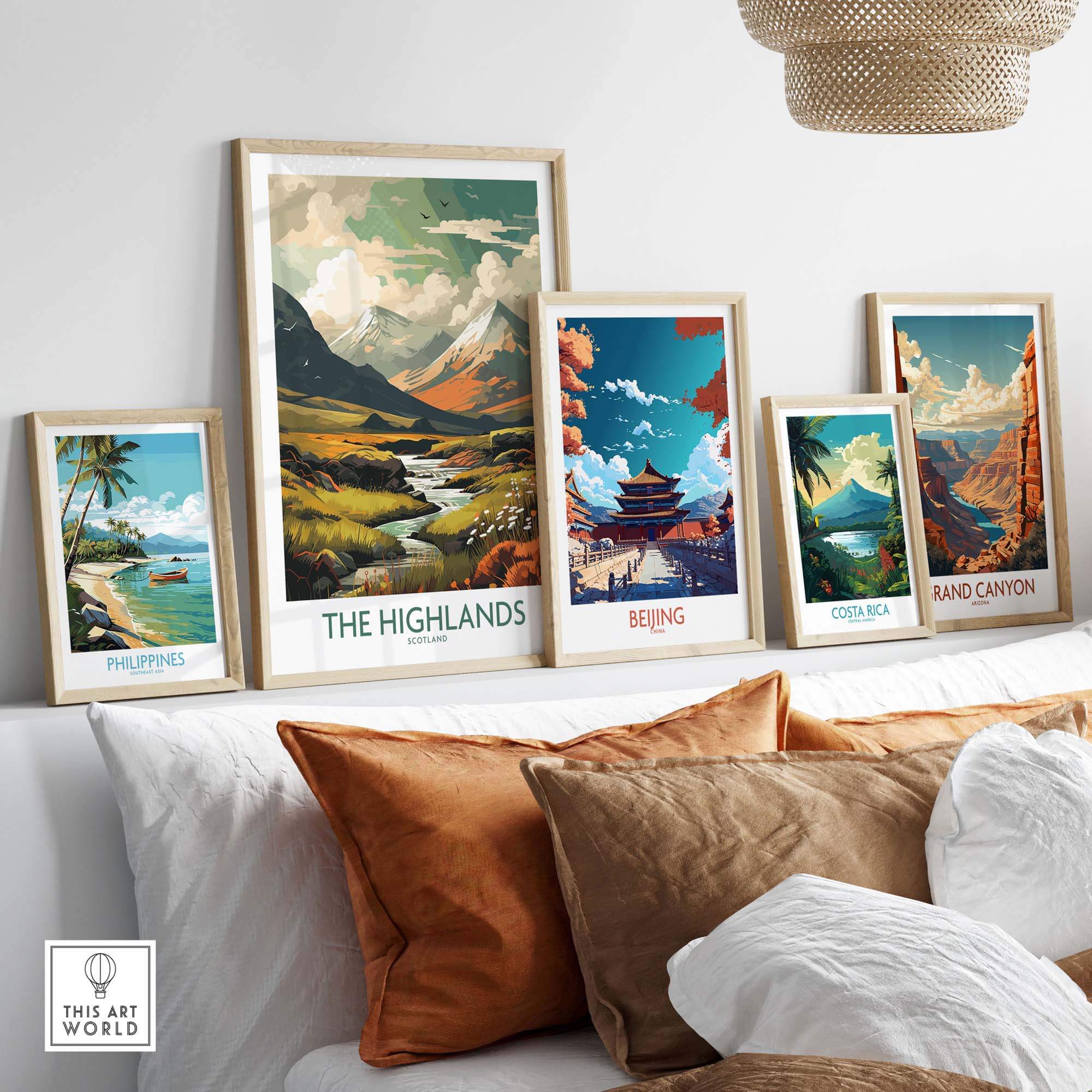 A collection of framed art prints featuring landscapes from the Scottish Highlands, Beijing, Costa Rica, and the Grand Canyon.