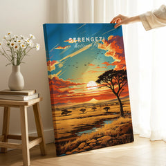 Serengeti National Park sunset canvas print with acacia tree, held in modern home decor setting.