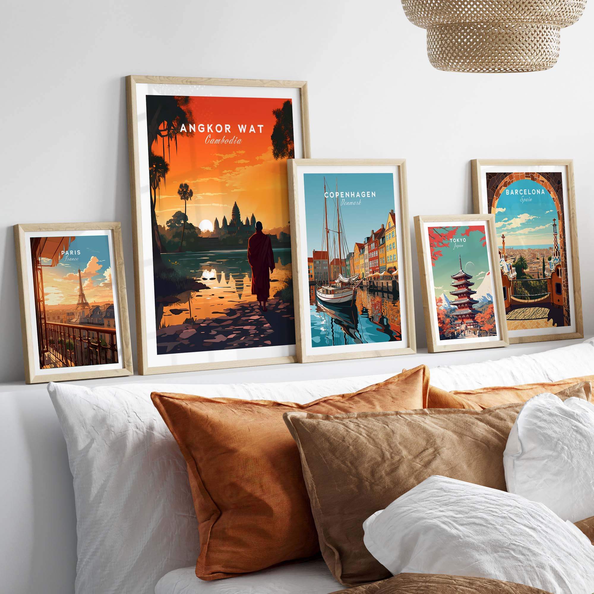 Stylish Angkor Wat wall art display showcasing travel posters in a cozy home decor setting.