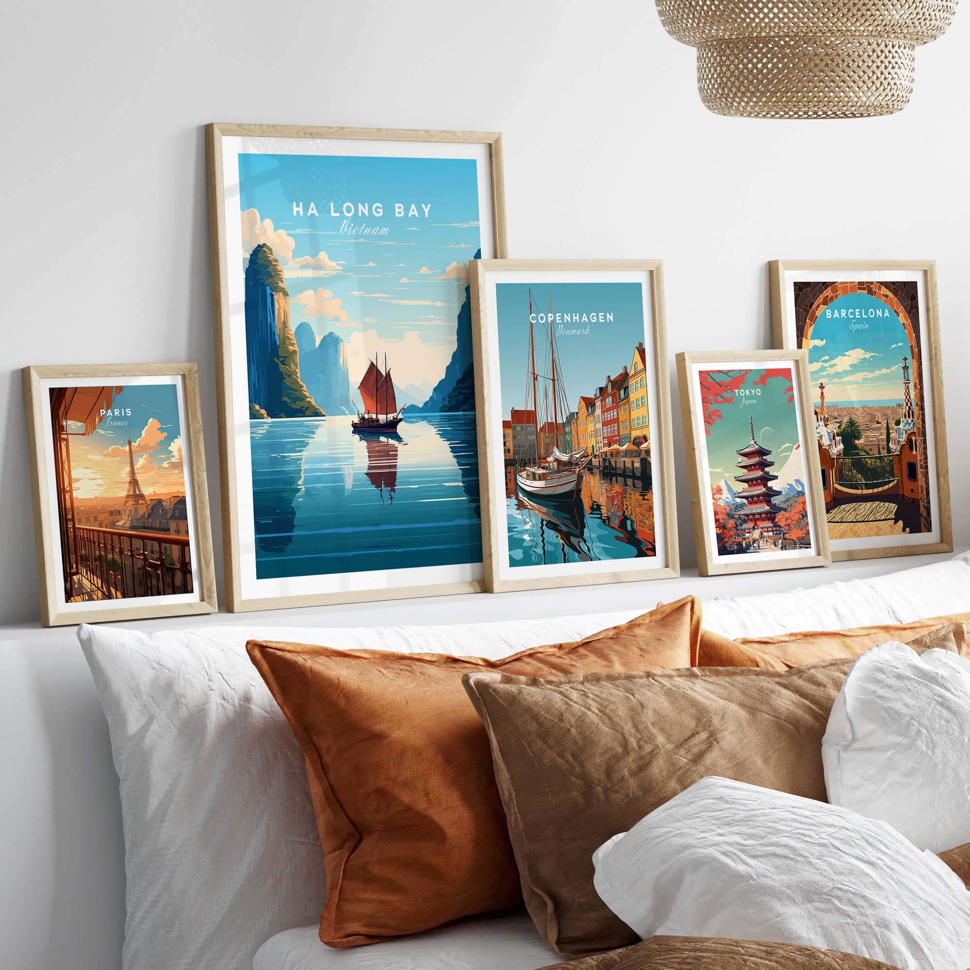 Framed Ha Long Bay poster with junk boat, surrounded by other city posters, adding charm to a cozy room.