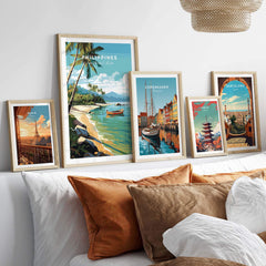 Gallery wall featuring vibrant Philippines Art Print alongside cityscape prints, perfect for tropical home decor.
