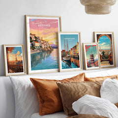 Skiathos Greece travel poster print displayed among vibrant travel art in a cozy home setting, showcasing Mediterranean charm.