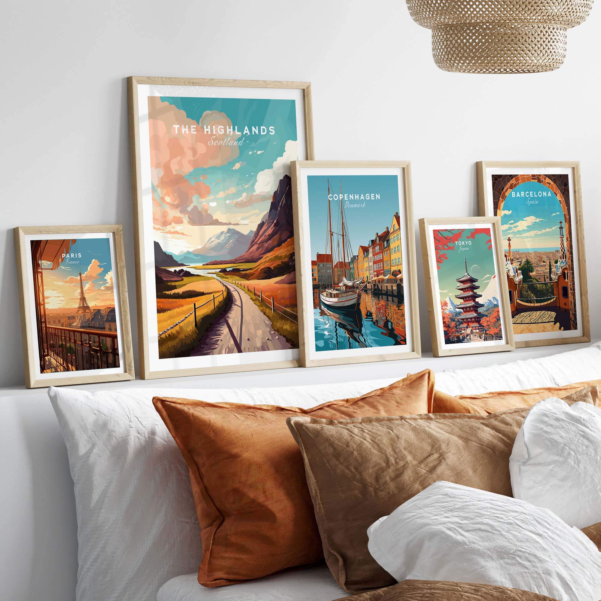 Scottish Highlands art print displayed with travel-themed prints in a cozy home setting.
