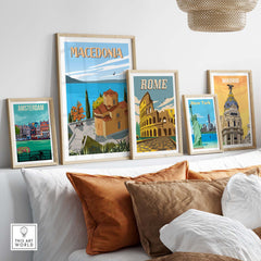 Colorful travel posters featuring Macedonia, Rome, Amsterdam, New York, and Madrid displayed on a cozy wall.